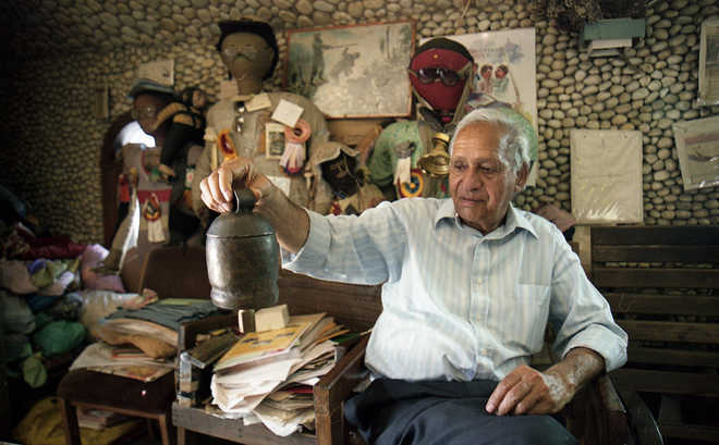 A-self-taught-artist-famed-for-building-Rock-Garden-in-Chandigarh-an-18-acre-spread-of-sculptures-made-using-scrap-and-rocks-in-his-office-in-the-garden