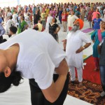 Mohali MP Prem Singh (front row, second from right) among those doing yoga on International Yoga Day at Sector 78, Mohali, on June 21, 2015
