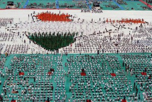 Participants practise yoga to mark the first International Yoga Day at GMDC ground in Ahmedabad on June 15, 2015