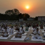 People practise yoga at a session to mark the International Yoga Day in Gurgaon on June 21, 2015