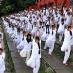 Students practise yoga to mark International Yoga Day at Dharamsala on June 15, 2015