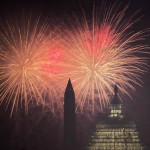 Fireworks explode behind the US Capitol and the Washington Monument in celebration of Independence Day in Washington, DC on July 4, 2015.