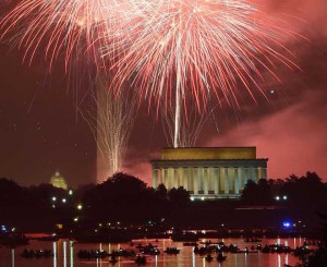 Fireworks explode over Lincoln Memorial, Washington Monument and US Capitol