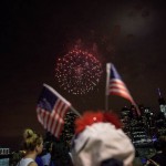 People watch Macy's Fourth of July Fireworks from Brooklyn Bridge Park on July 4, 2015 in the Brooklyn borough of New York City. The celebrations mark the nation's 239th Independence Day.