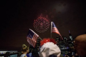 People watch Macy's Fourth of July Fireworks from Brooklyn Bridge Park on July 4, 2015 in the Brooklyn borough of New York City. The celebrations mark the nation's 239th Independence Day.