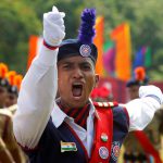 A cadet from the National Cadet Corps (NCC) commands a parade during Independence Day celebrations in Agartala.