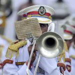 A paramilitary force trooper plays a trumpet during the final dress rehearsal for Independence Day celebration in Agartala, capital of northeastern state of Tripura on August 13, 2016