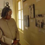 President APJ Abdul Kalam evinces keen interest in the photographs connected with the life of Shaheed Bhagat Singh at the museum in the latter's ancestral village, Khatkar Kalan, on March 23, 2003.