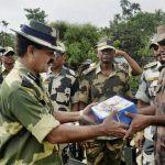 BSF personnel exchange sweets with BGB officers during the70th Independence Day celebrations at the Indo-Bangladesh border