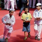Children rejoice after receiving sweets during the 70th Independence Day celebrations at AICC headquarters in New Delhi