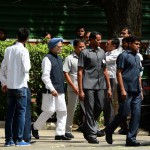 Former Prime Minister Manmohan Singh leaves after paying homage to former President APJ Abdul Kalam at his house in New Delhi on July 28, 2015.