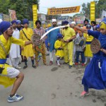 Nihang, religious Sikh warriors, show their skills in the Sikh martial art known as 'Gatka' during a procession for Guru Nanak Dev's marriage anniversary from the Gurdwara Sri Dehra Sahib temple to the Kandh Sahib temple in Batala, some 45 km (28 miles) northeast of Amritsar on September 20, 2015