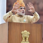 Prime Minister Narendra Modi gestures while addressing the nation during the 69th Independence Day function at the historic Red Fort in New Delhi