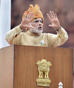 Prime Minister Narendra Modi gestures while addressing the nation during the 69th Independence Day function at the historic Red Fort in New Delhi