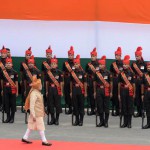Prime Minister Narendra Modi (C) inspects an honour guard of troops after delivering his Independence Day speech from The Red Fort in New Delhi on August 15, 2015. Modi warned that corruption was eating away at India