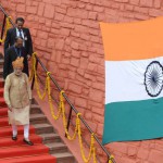 Prime Minister Narendra Modi (C) walks with officials after delivering his Independence Day speech from The Red Fort in New Delhi on August 15, 2015