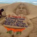 Sand artist Sudarsan Pattnaik gives tribute through his sand sculpture to former President and scientist, APJ Abdul Kalam (83) at Puri beach, some 65 km from Bhubaneswar on July 28, 2015.
