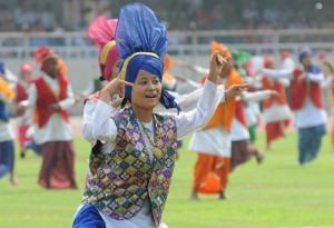 School students performing bhangra during the 69th Independence Day function at Guru Nanak Stadium in Ludhiana