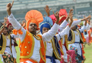 School students performing bhangra during the 69th Independence Day function at Guru Nanak Stadium in Ludhiana