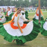 Students perform during the state-level Independence Day function at Dronacharya Stadium in Kurukshetra