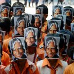Students wear masks of former President APJ Abdul Kalam at an event to mark former president APJ Abdul Kalam’s 85th birth anniversary in Chennai on October 15, 2016.