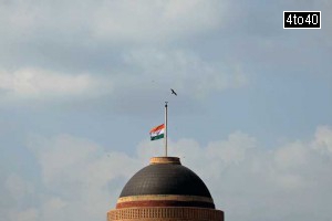 The national flag flies at half-mast at the President's House in New Delhi on July 28, 2015.
