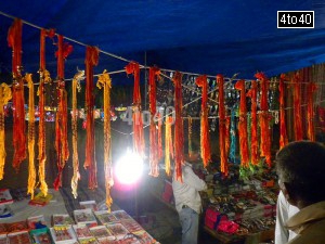 Sisters buy rakhis and threads to mail to their brothers, distant brothers