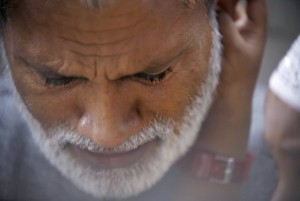 A Nepalese Muslim cries while attending a mass prayer during the Eid al-Adha celebrations at the Kashmiri Takiya Jame mosque in Kathmandu, Nepal, on September 25, 2015