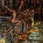 A Sadhu, or Hindu holy man, jumps in a holy pond during the second ‘Shahi Snan’ (grand bath) at ‘Kumbh Mela’, or Pitcher Festival, in Trimbakeshwar September 13, 2015