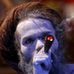 A Sadhu, or Hindu holy man, smokes inside his tent during the second ‘Shahi Snan’ (grand bath) at Kumbh Mela, or Pitcher Festival, in Trimbakeshwar on September 13, 2015