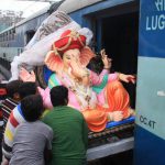 An Idol of Lord Ganesha being boarded into a train in Mumbai