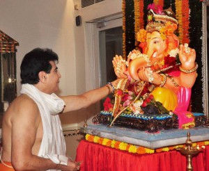 Bollywood actor Jeetendra offers prayers the elephant-headed Hindu god Lord Ganesh during the Ganesh festival in Mumbai on September 18, 2015