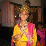 Boy dressed as Lord Krishna on the eve of Janmashtami