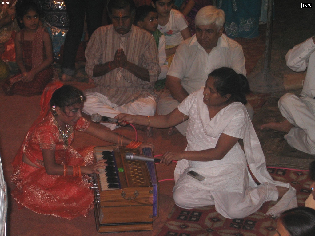 Children singing devotional song on the occasion of Janmashtami