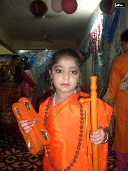 Cosy Apartments resident & a school girl dressed as Meera on eve of Janmashtami