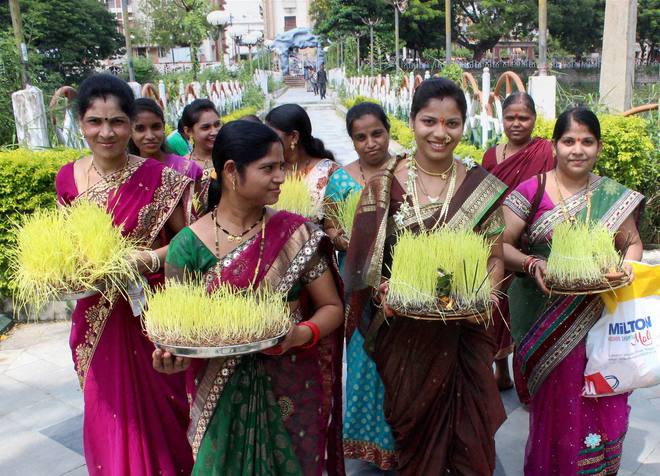 Devotees take part in ‘Gauri Puja’, part of Ganesh Chaturti festival, in Nagpur on September 15, 2015