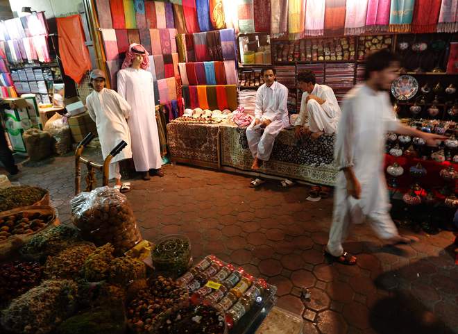 Emiratis shop at the Deira Spice Souk ahead of the Muslim fasting month of Ramadan on June 5, in Dubai.
