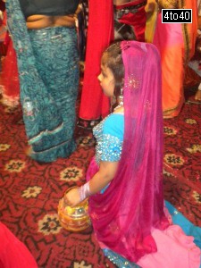 Girl dressed as Gopi getting excited for her turn to perform an item dance at stage on eve of Janmashtami at Vidya Vihar Apartments, Rohini, New Delhi