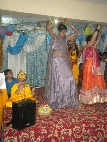 Girls dressed as Gopis performing a dance item on the occasion of Janmashtami celebrations at Cosy Apartments, Sector 9, Rohini, New Delhi