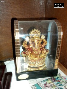 Glass covered statue of Lord Ganesha