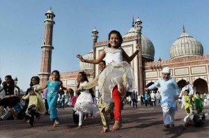 Muslim children play on Eid al-Adha at Jama Masjid in New Delhi on September 25, 2015