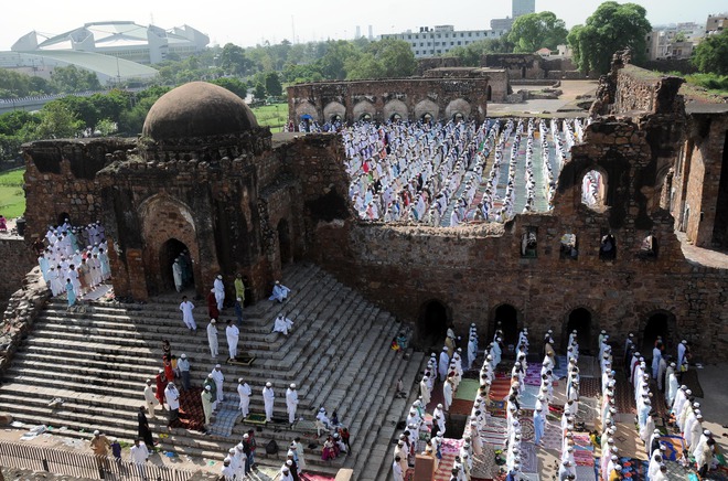 Muslims offer prayers at the Jama Masjid in Delhi on Eid al-Adha on September 25, 2015
