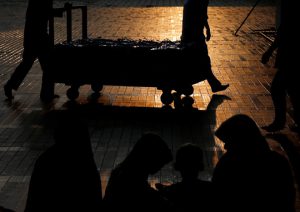 Officials push a cart containing boxes of food to break the fast during the holy month of Ramadan inside Istiqlal mosque in Jakarta, Indonesia June 6.