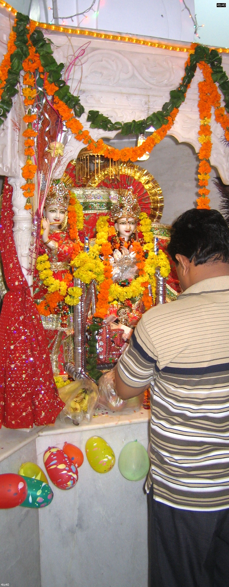 People pray at temples on occasion of Krishna Janmashtami