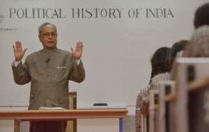 President Pranab Mukherjee teaches students at a government school to mark Teachers’ Day in New Delhi on Septmber 5, 2015