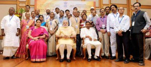 Prime Minister Narendra Modi in a group photograph at an informal interaction with the National Awardee Teachers on eve of the Teachers’ Day in New Delhi on September 5, 2015 Friday. Human Resource Development Minister Smriti Irani is also seen