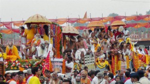 Sadhus or Hindu holy men arrive to take a holy dip in the waters of Godavari river during the second ‘Shahi Snan’ (grand bath) at the Kumbh Mela or Pitcher Festival in Nashik on September 13, 2015