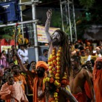 Sadhus, or Hindu holy men, attend a procession before taking a dip in a holy pond during the second ‘Shahi Snan’ (grand bath) at the Kumbh Mela or Pitcher Festival in Nashik on September 13, 2015