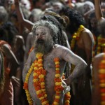 Sadhus, or Hindu holy men, wait during a procession before taking a dip in a holy pond during the second ‘Shahi Snan’ (grand bath) at Kumbh Mela, or Pitcher Festival, in Trimbakeshwar on September 13, 2015