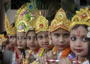 Schoolchildren dressed as Hindu Lord Krishna wait to perform during celebrations to mark Janmashtami, a festival that marks the birth anniversary of the Hindu God, in Agartala on September 5, 2015